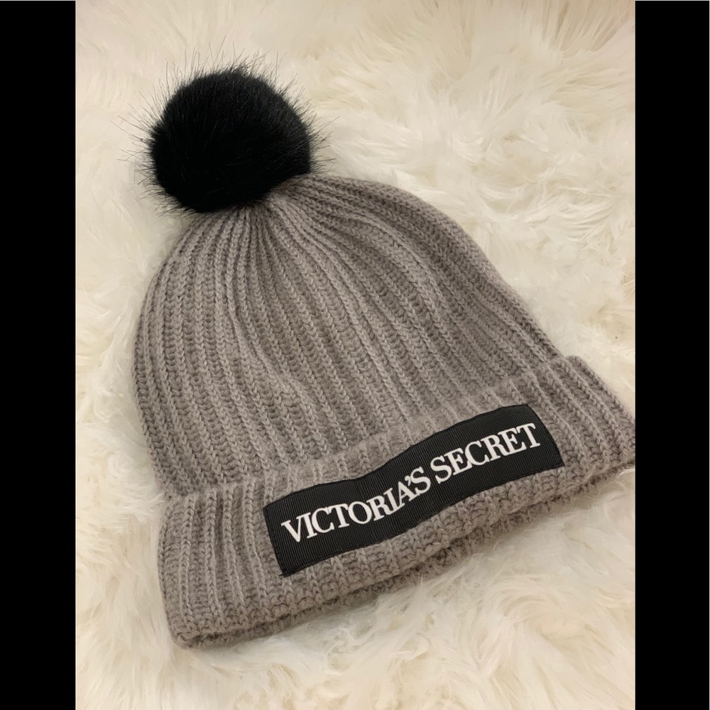 Victoria’s Secret gray and black Pom-Pom hat